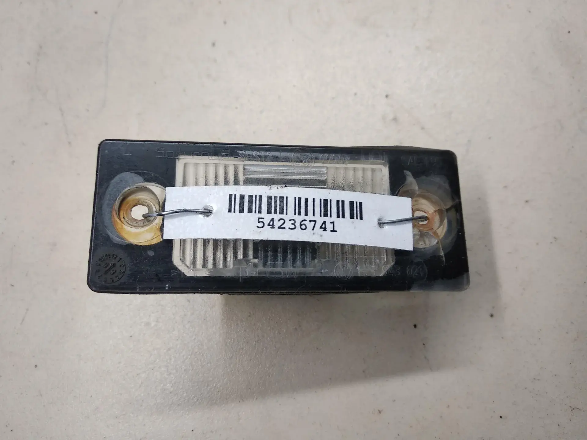 Фонарь подсветки номерного знака 1J5943021