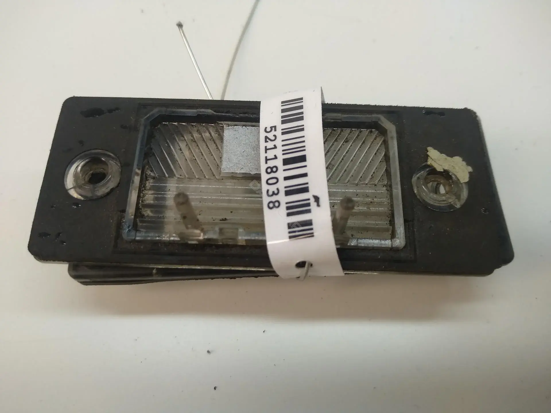 Фонарь подсветки номерного знака 1J5943021D