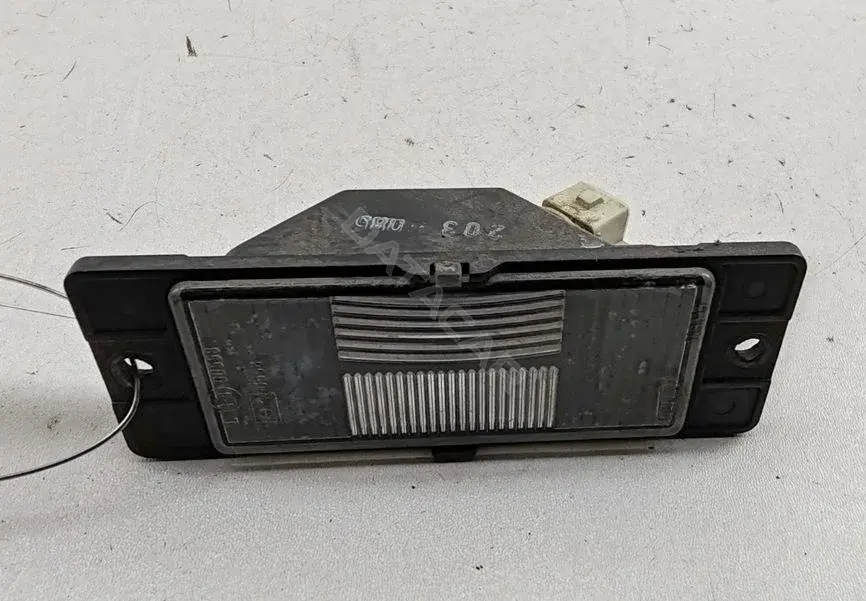 Фонарь подсветки номерного знака MR245531
