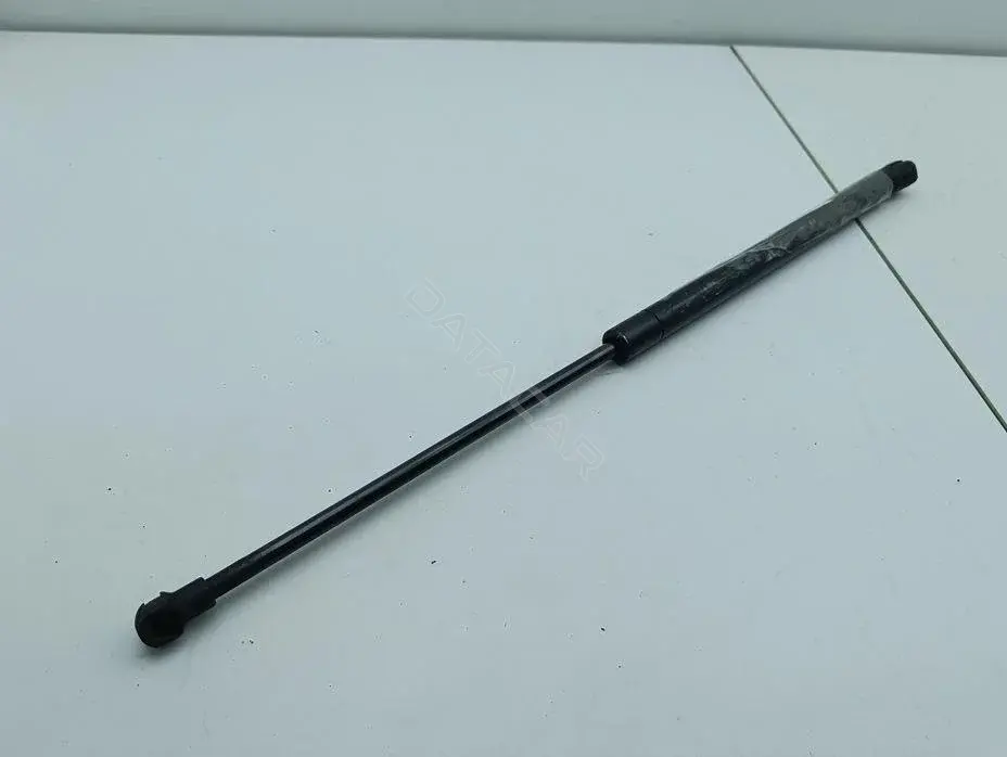 Амортизатор крышки багажника, капота, заднего стекла 1J0823359
