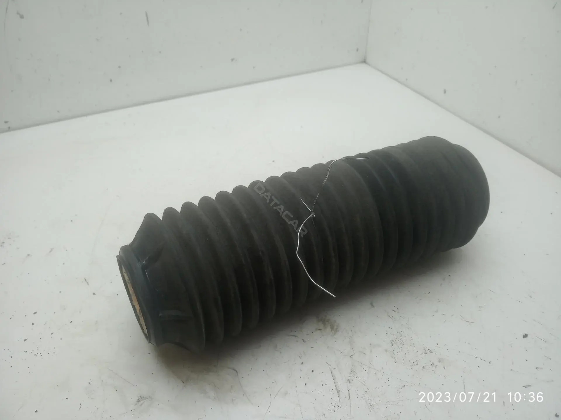 Пыльник амортизатора yc153k036ac