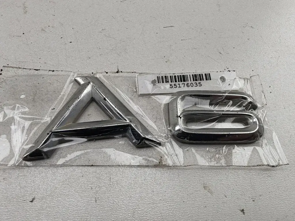 Эмблема 4A9853741B, 4D0853741