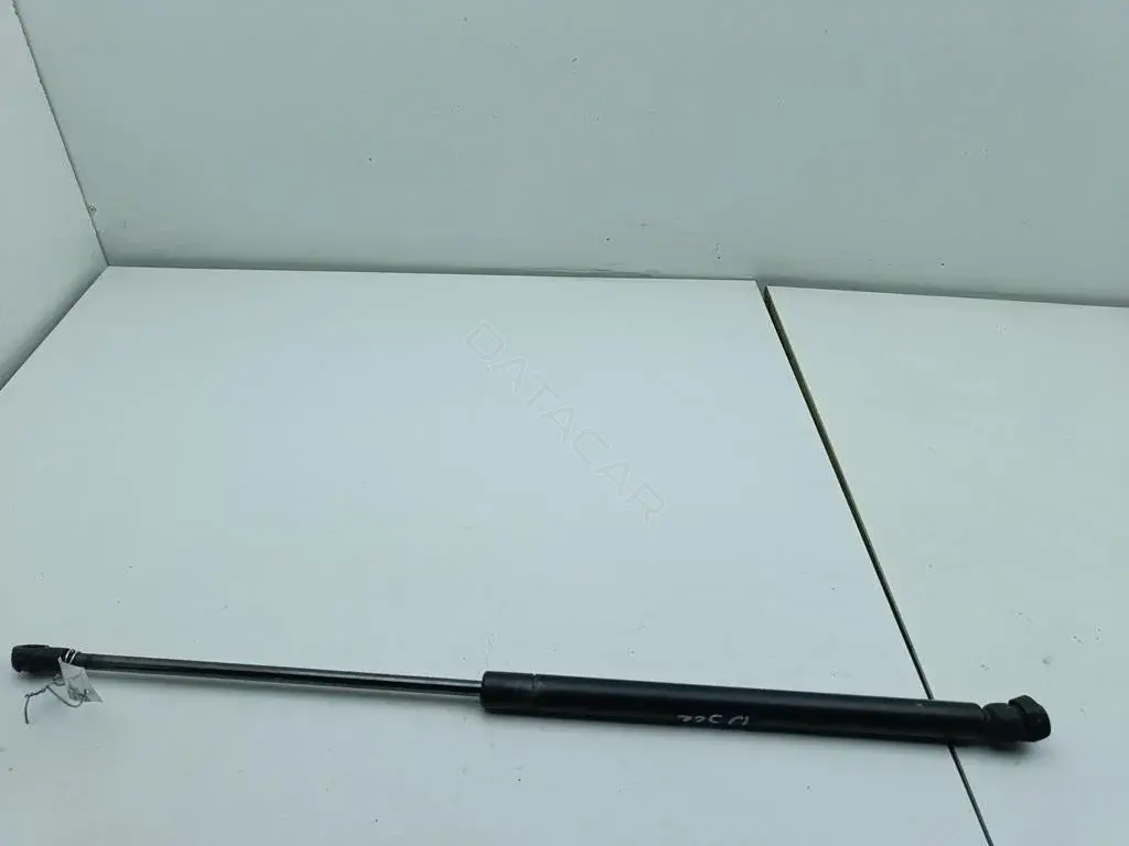 Амортизатор крышки багажника, капота, заднего стекла 1J0823359