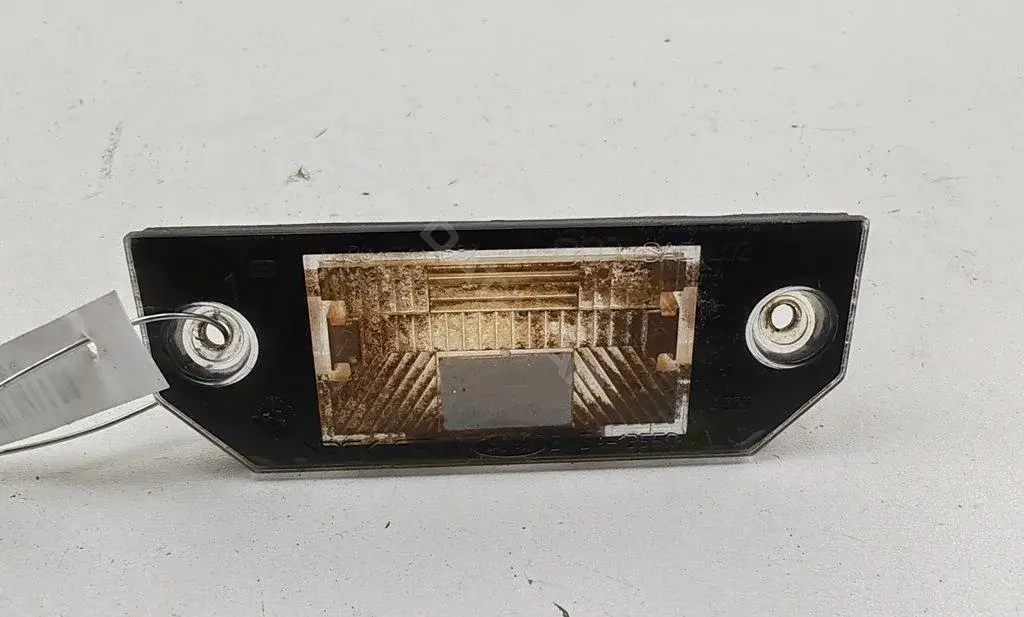 Фонарь подсветки номерного знака 3M5A13550A