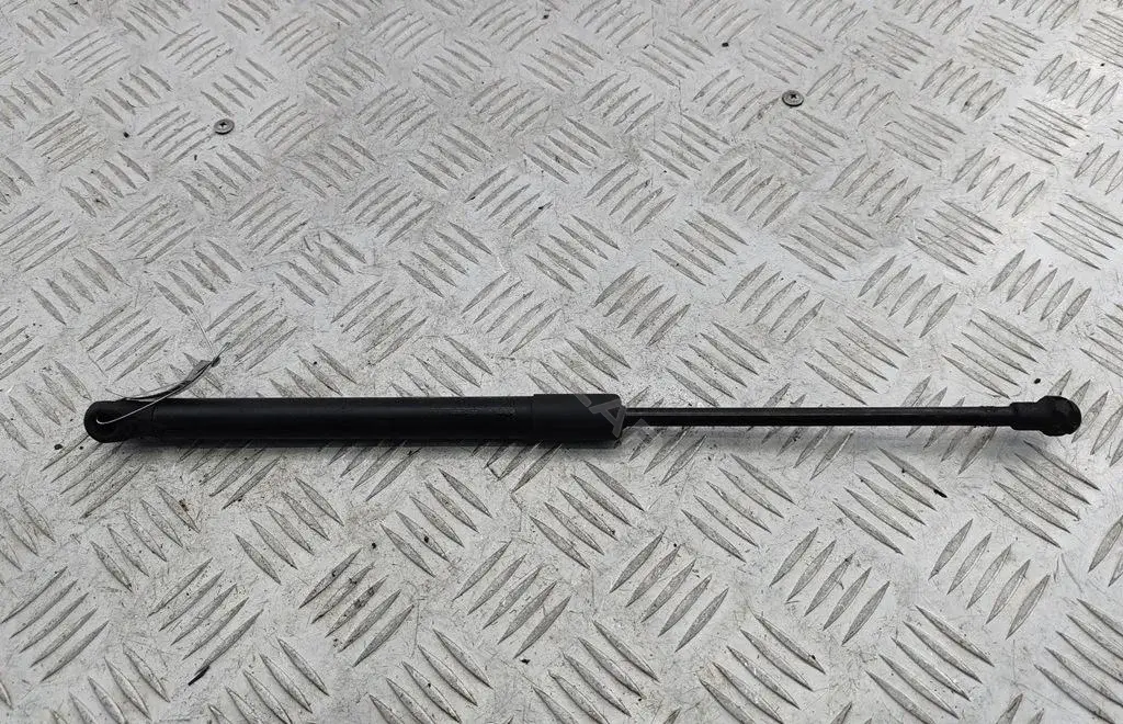 Амортизатор крышки багажника, капота, заднего стекла 1T0823359C