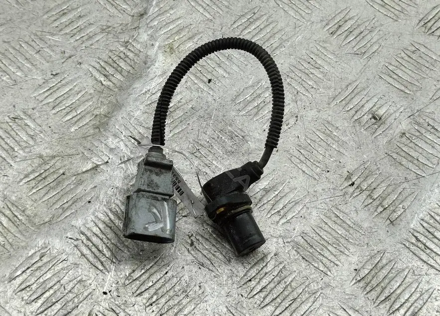 Датчик коленвала 06A906433K