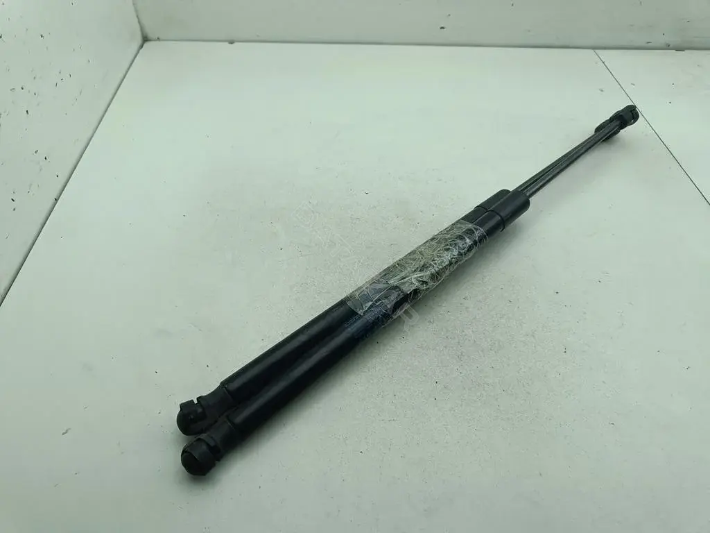 Амортизатор крышки багажника, капота, заднего стекла 1T0827550