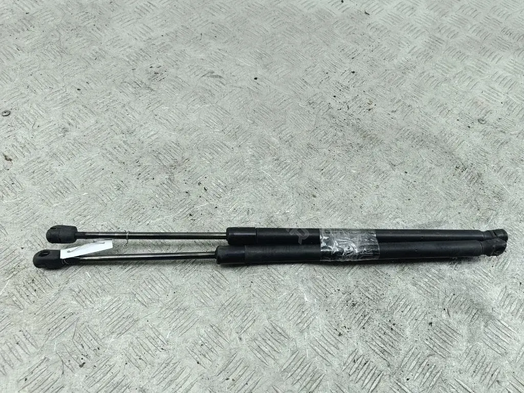 Амортизатор крышки багажника, капота, заднего стекла 1T0827550C