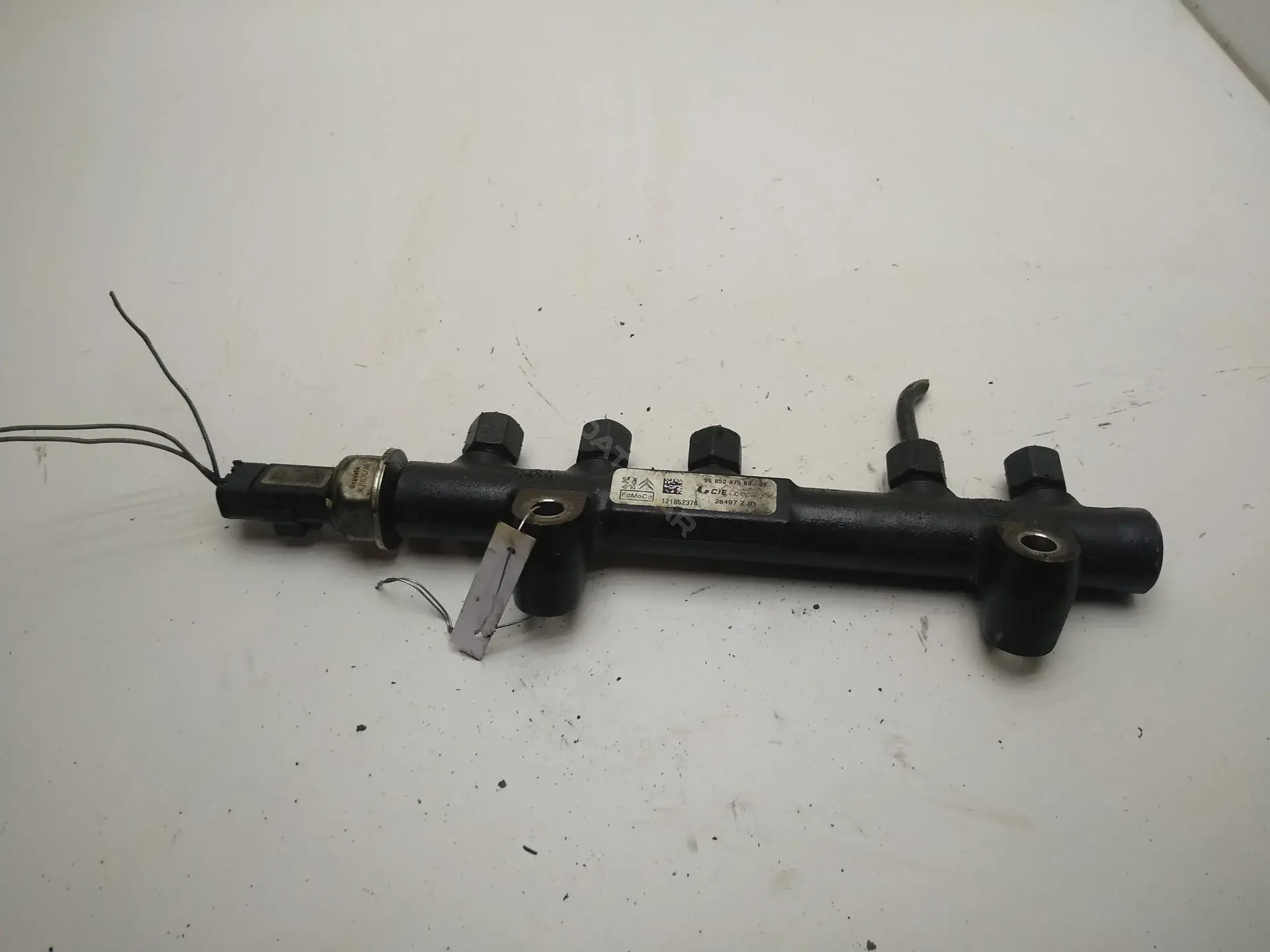 Топливная рейка 1697684 / AV6Q-9D280-B1A
