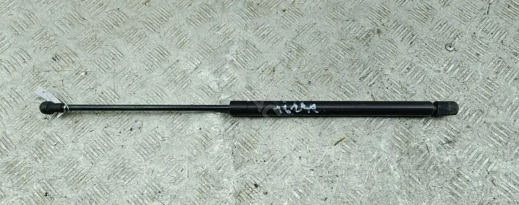 Амортизатор крышки багажника, капота, заднего стекла 1J6827550