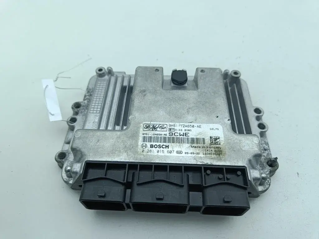Блок управления двигателем 9M51-12A650-AE
