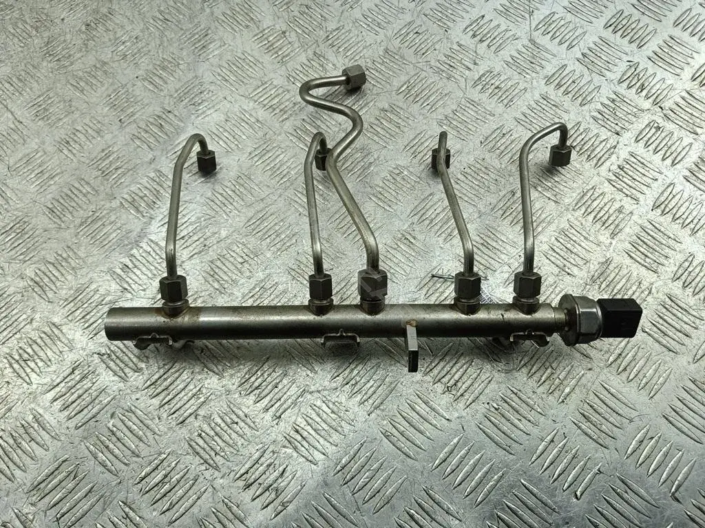 Топливная рейка 7537319, 7562474