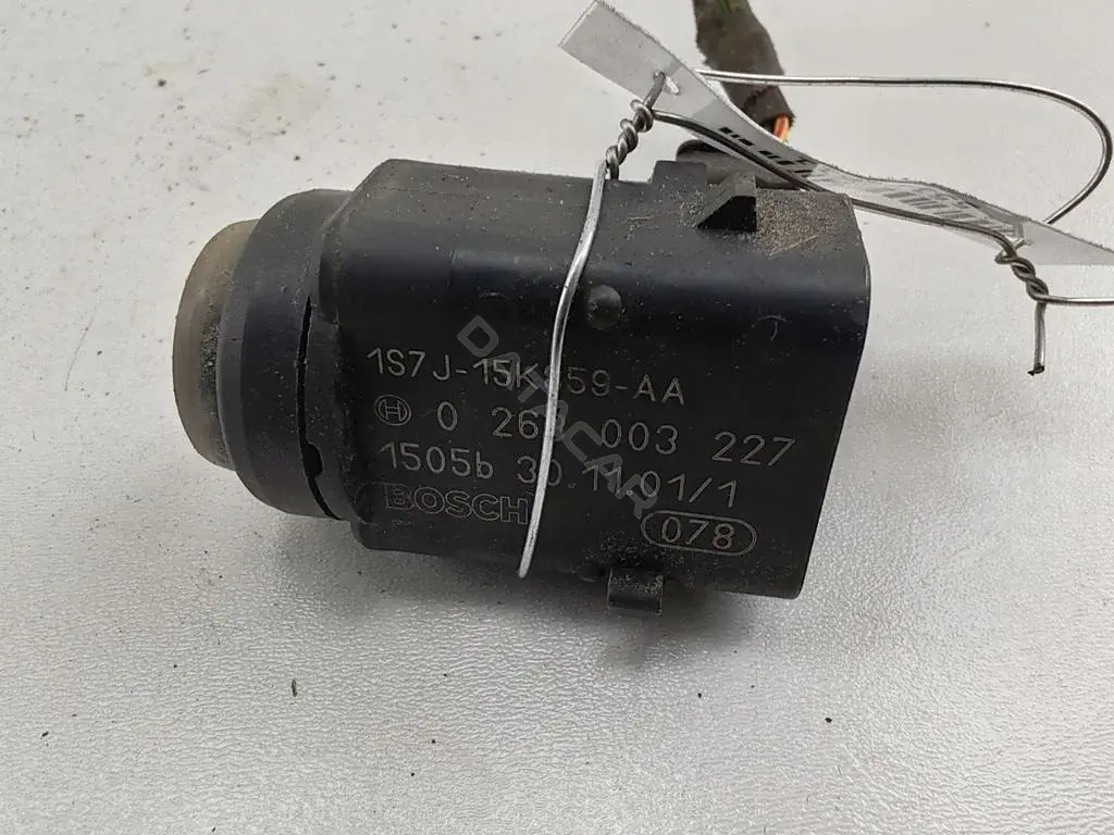 Датчик парктроника 1S7J-15K859-AA