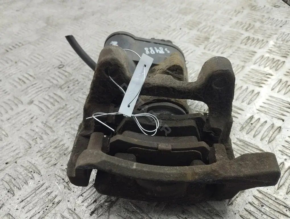 Суппорт тормозной 55287351
