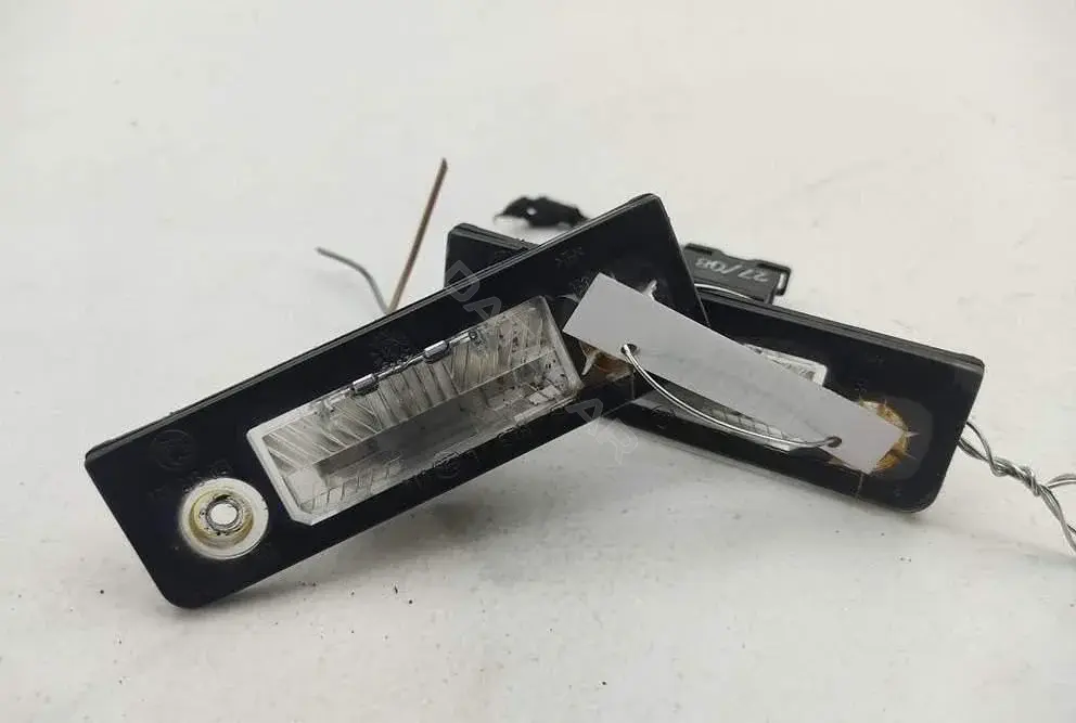Фонарь подсветки номерного знака 1Z0943021