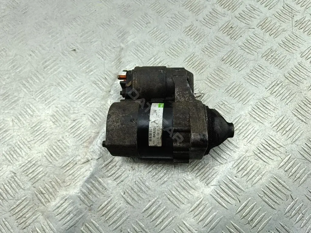Стартер 233001F77C