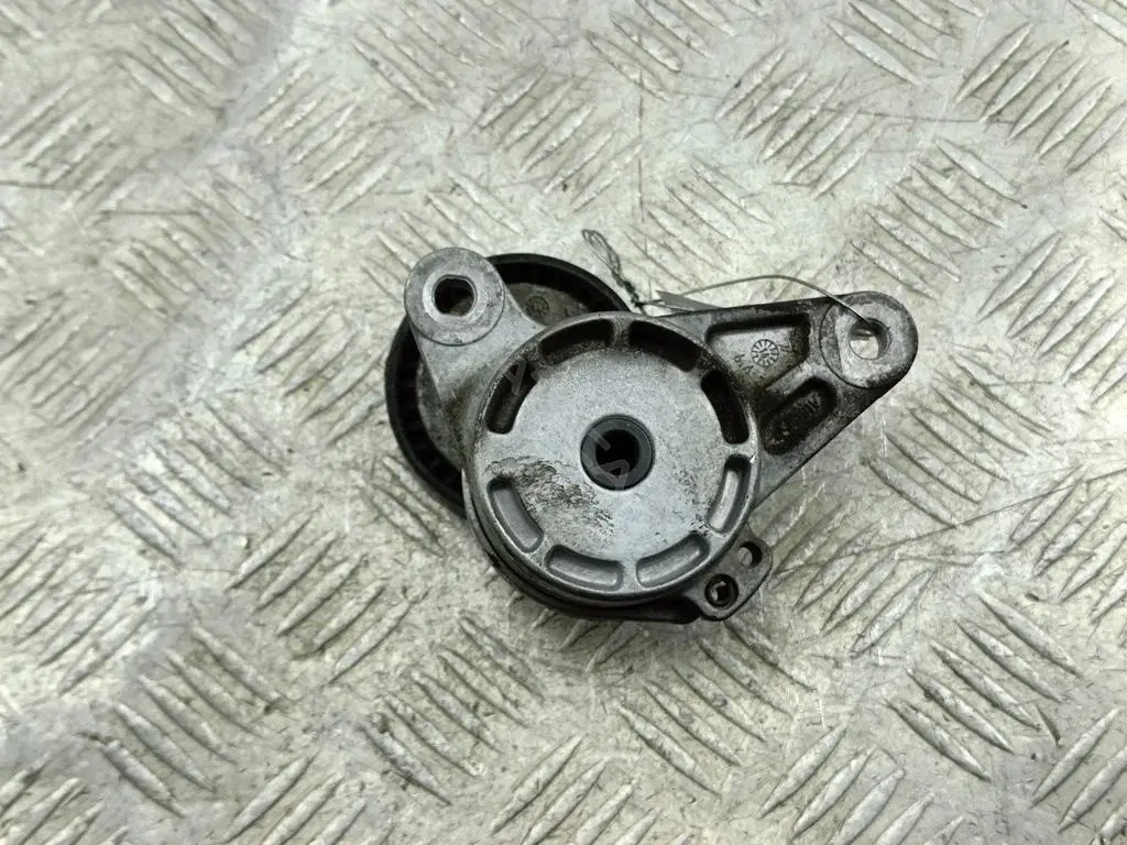 Натяжитель ремня генератора 04L903315D