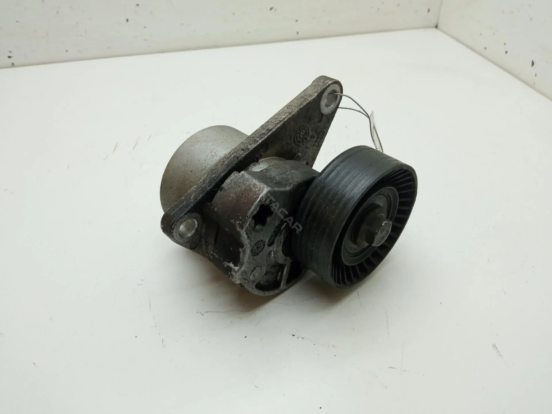 Натяжитель ремня генератора 54711344