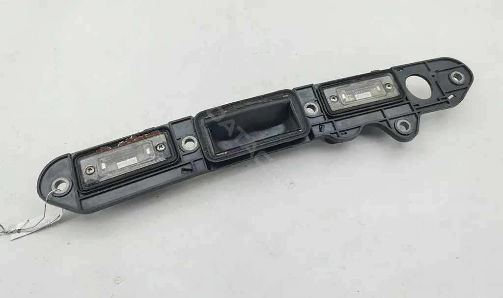 Фонарь подсветки номерного знака 1T0827574C