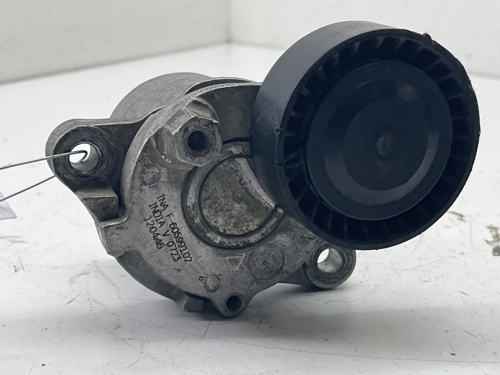 Натяжитель ремня генератора F-60599102
