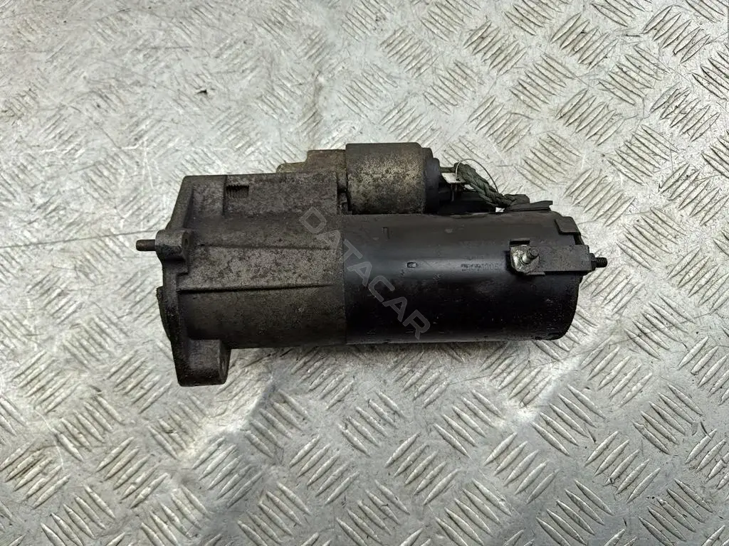 Стартер 03G911023