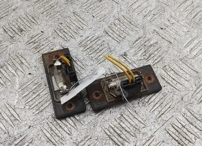 Фонарь подсветки номерного знака 1J5943021D