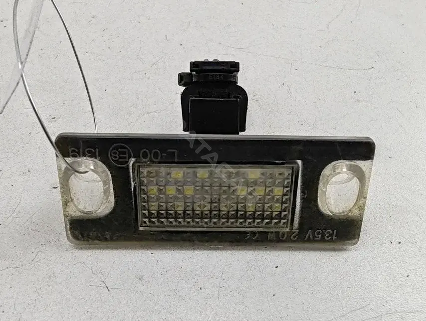 Фонарь подсветки номерного знака L001319