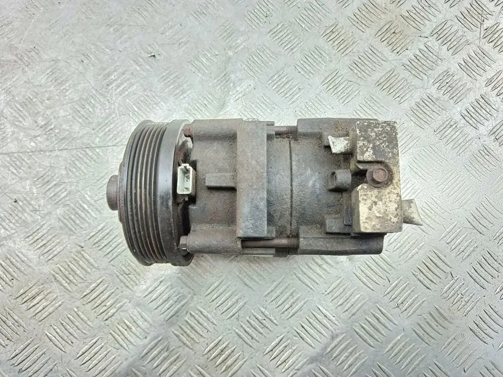 Компрессор кондиционера 4S7119D629AA