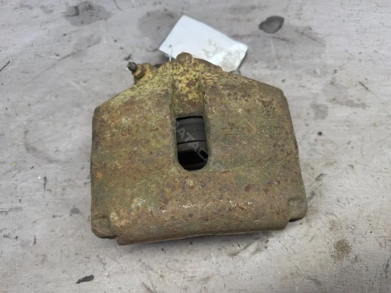 Суппорт тормозной 1K0615124E