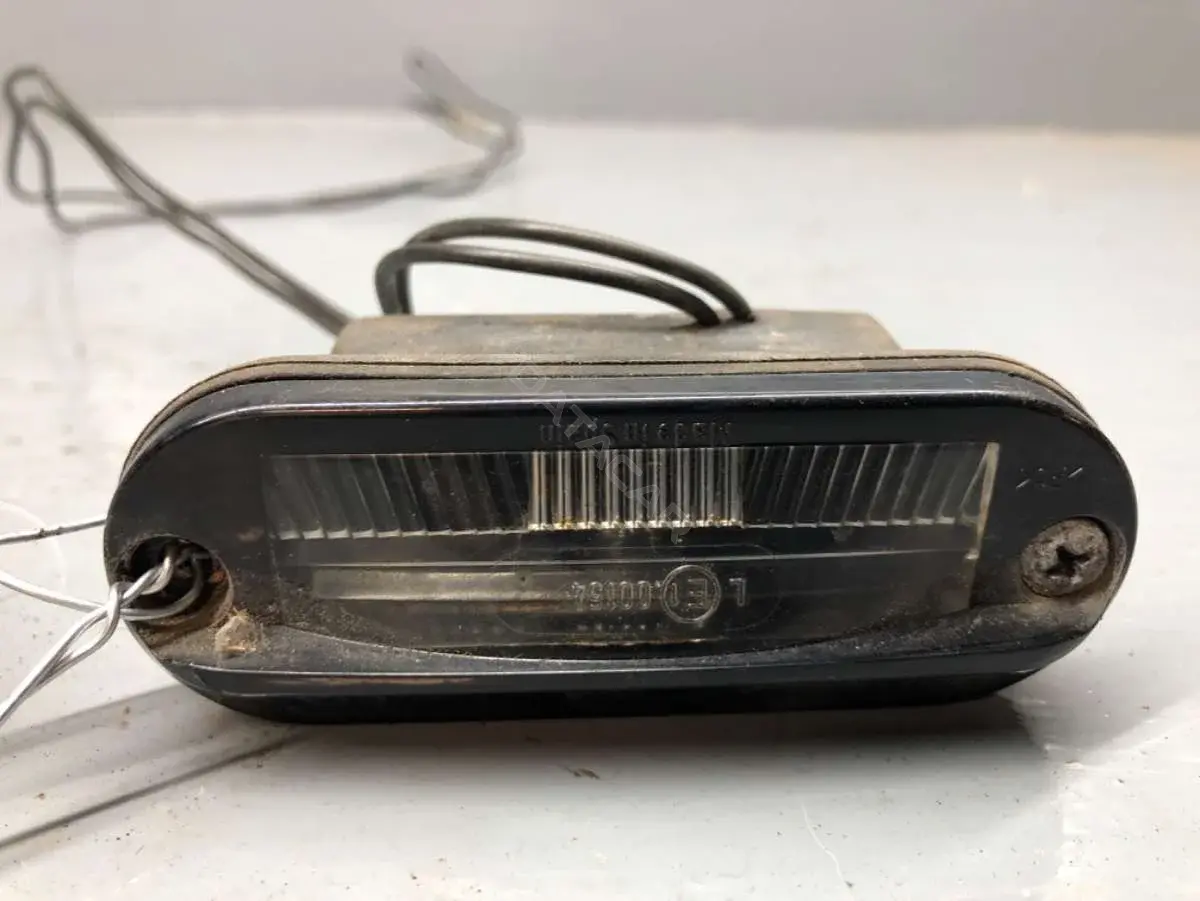 Фонарь подсветки номерного знака 7203220, 7M0943021, 95VW13550AA