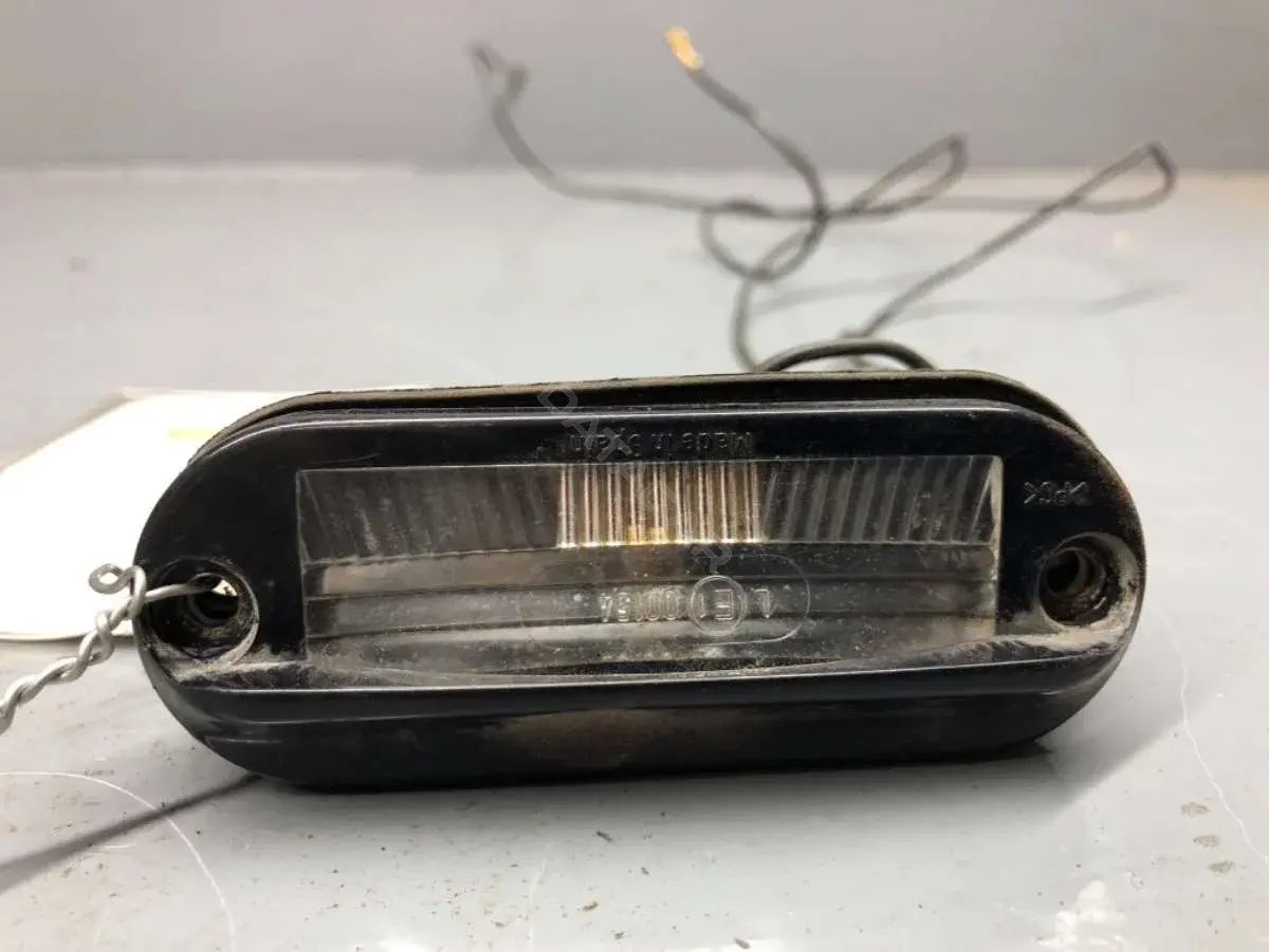 Фонарь подсветки номерного знака 7203220, 7M0943021, 95VW13550AA