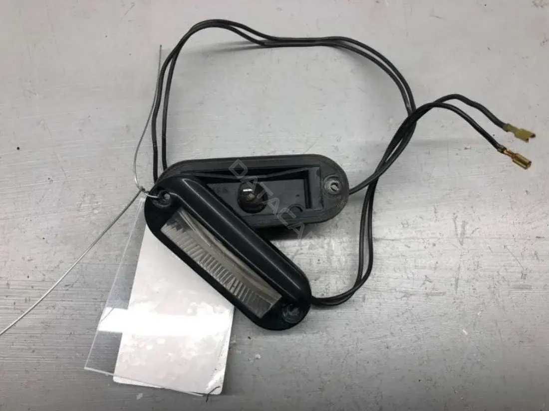 Фонарь подсветки номерного знака 7M0943021, 95VW-13550-AA