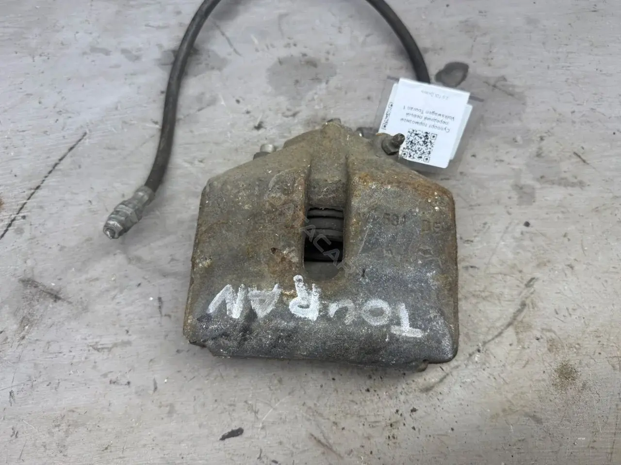 Суппорт тормозной 1K0615123E