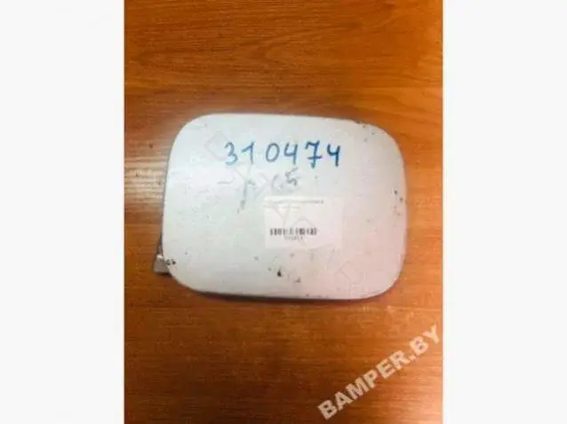 Крышка лючка топливного бака 310474