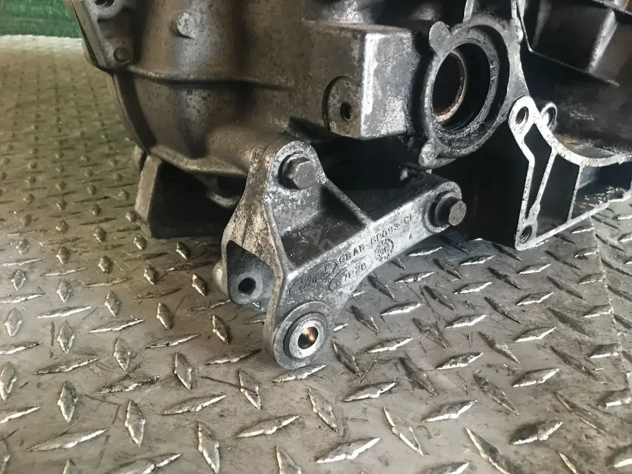 Кронштейн КПП 98AB6P093CF