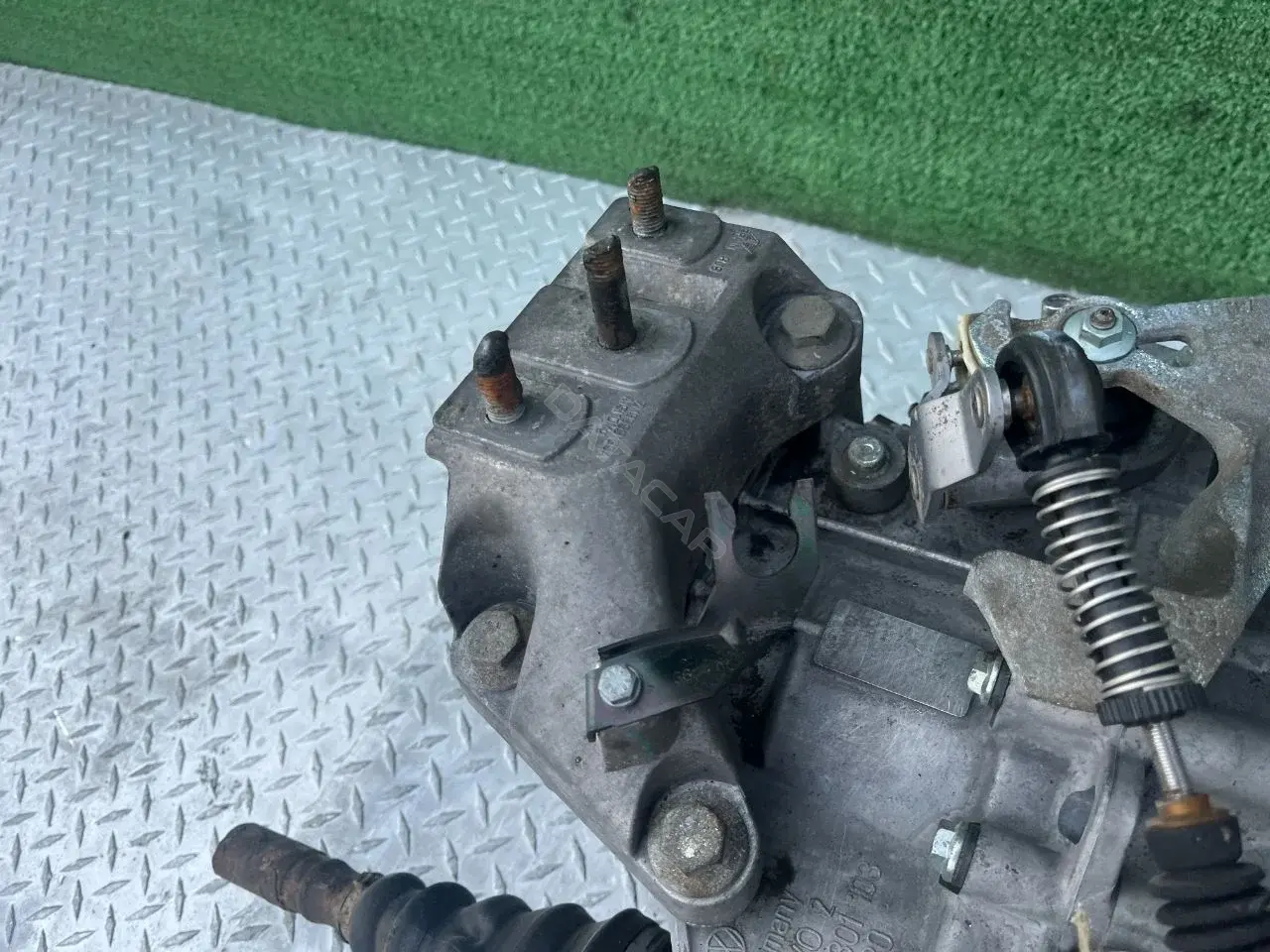 Кронштейн КПП 7M3399135A