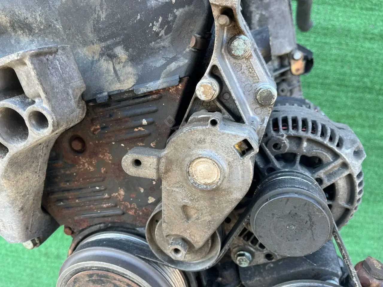 Натяжитель ремня генератора 950464