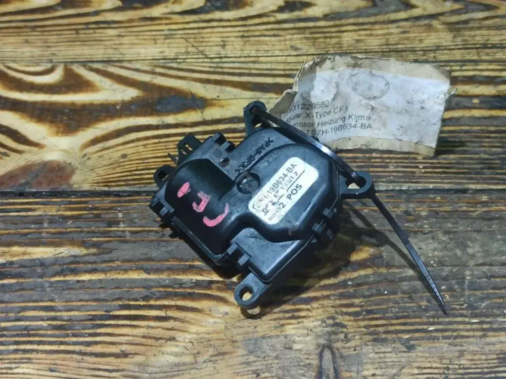 Мотор заслонки печки 1S7H19B634BA