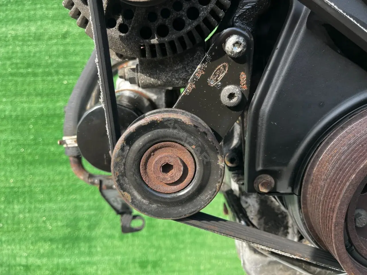Натяжитель ремня генератора 93BB19A216BF