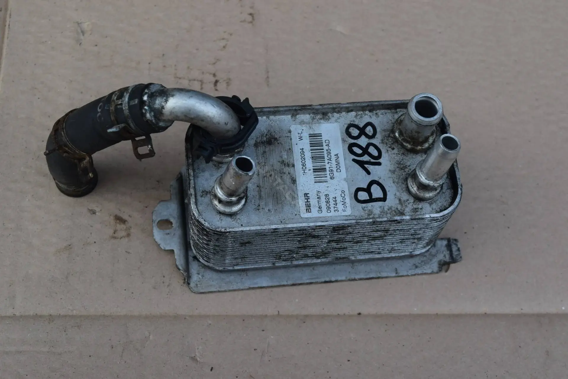 Радиатор АКПП 6G917A095AD