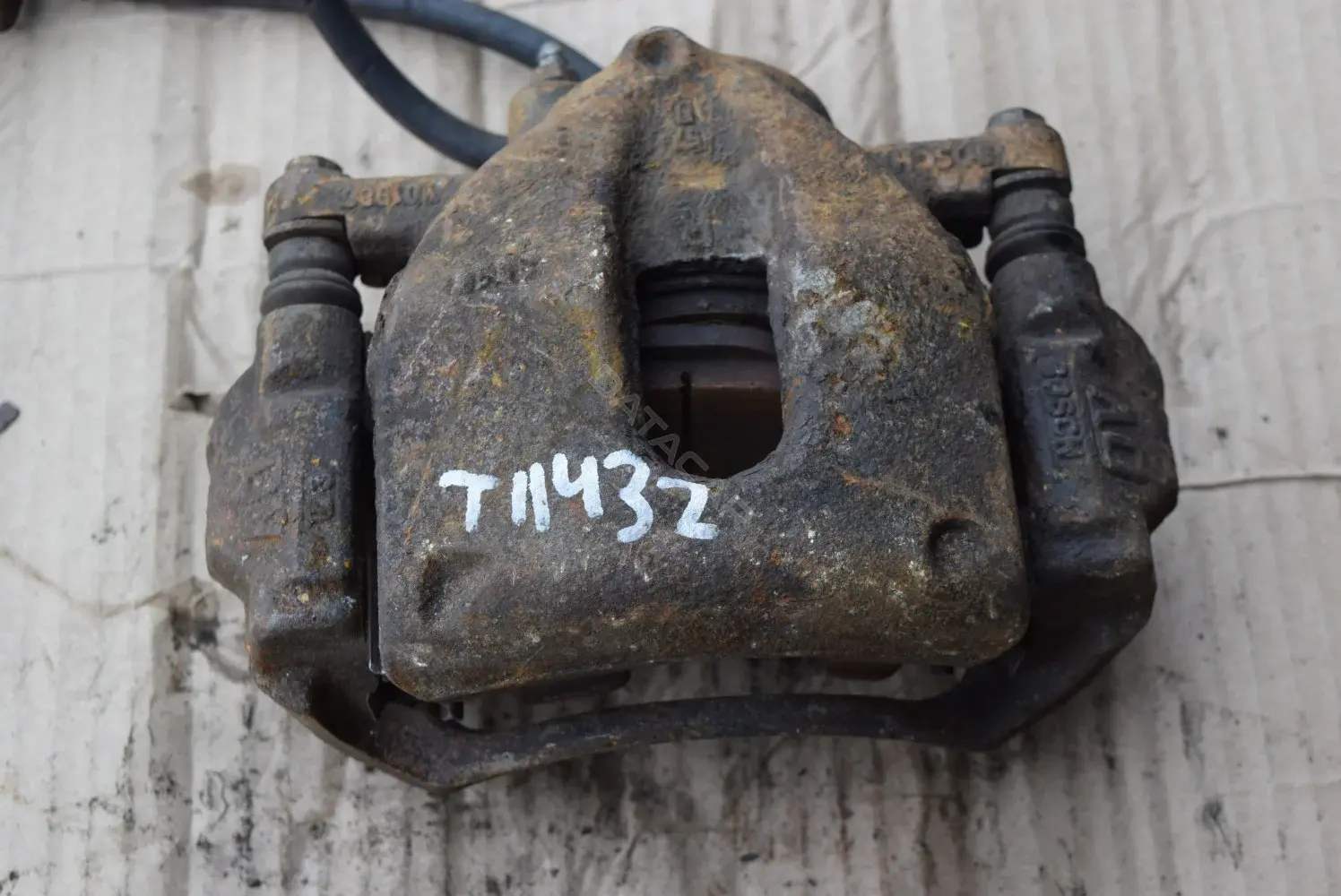 Суппорт тормозной T11432-72-1