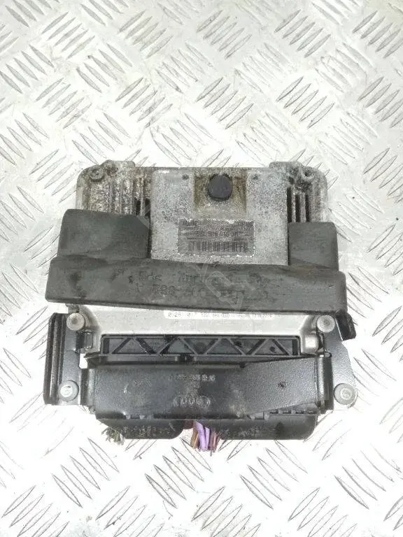 Блок управления двигателем 03L906018, 03L906018JR