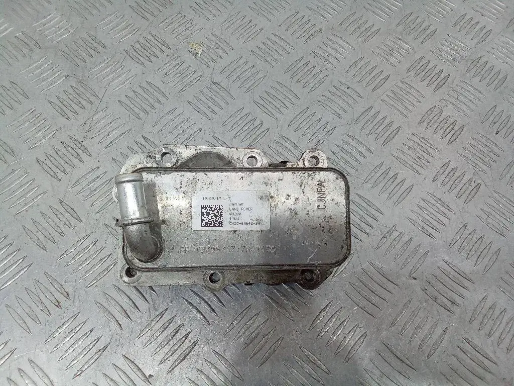 Масляный радиатор двигателя G4D36A642BA