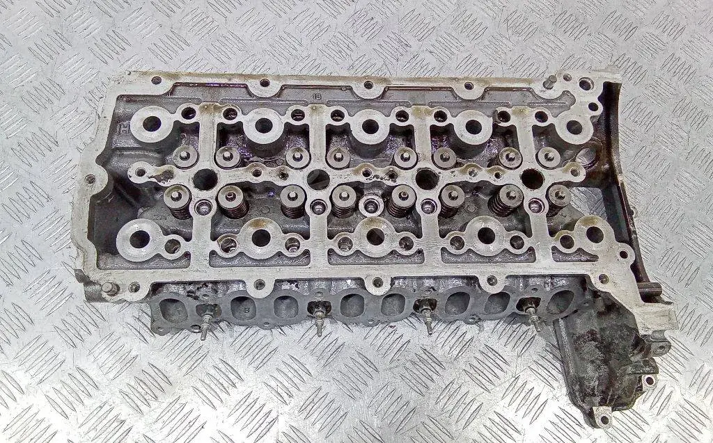 Головка блока цилиндров G4D3-6090-AC