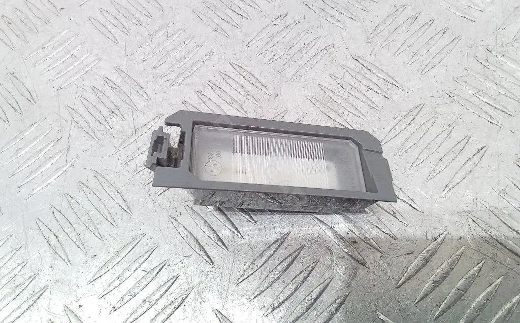 Фонарь подсветки номерного знака 92510-N7100