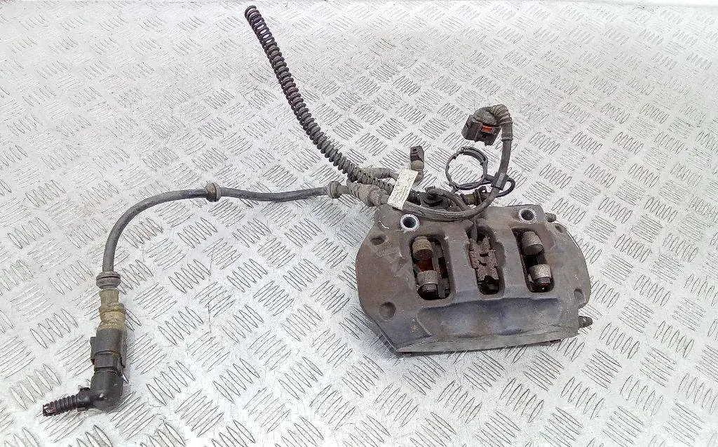 Суппорт тормозной 7P0615423