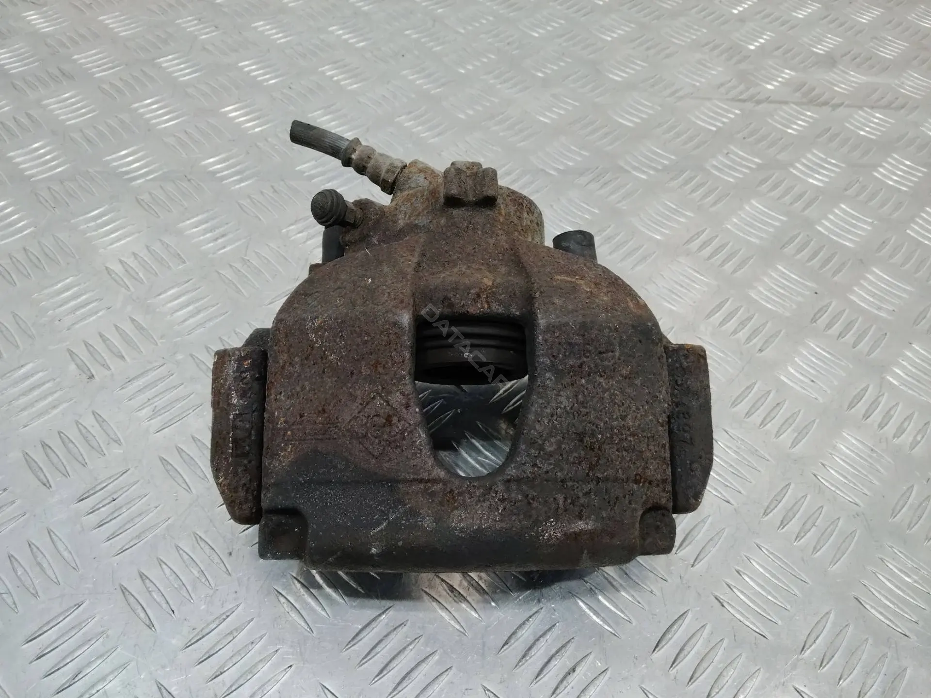Суппорт тормозной 5199038