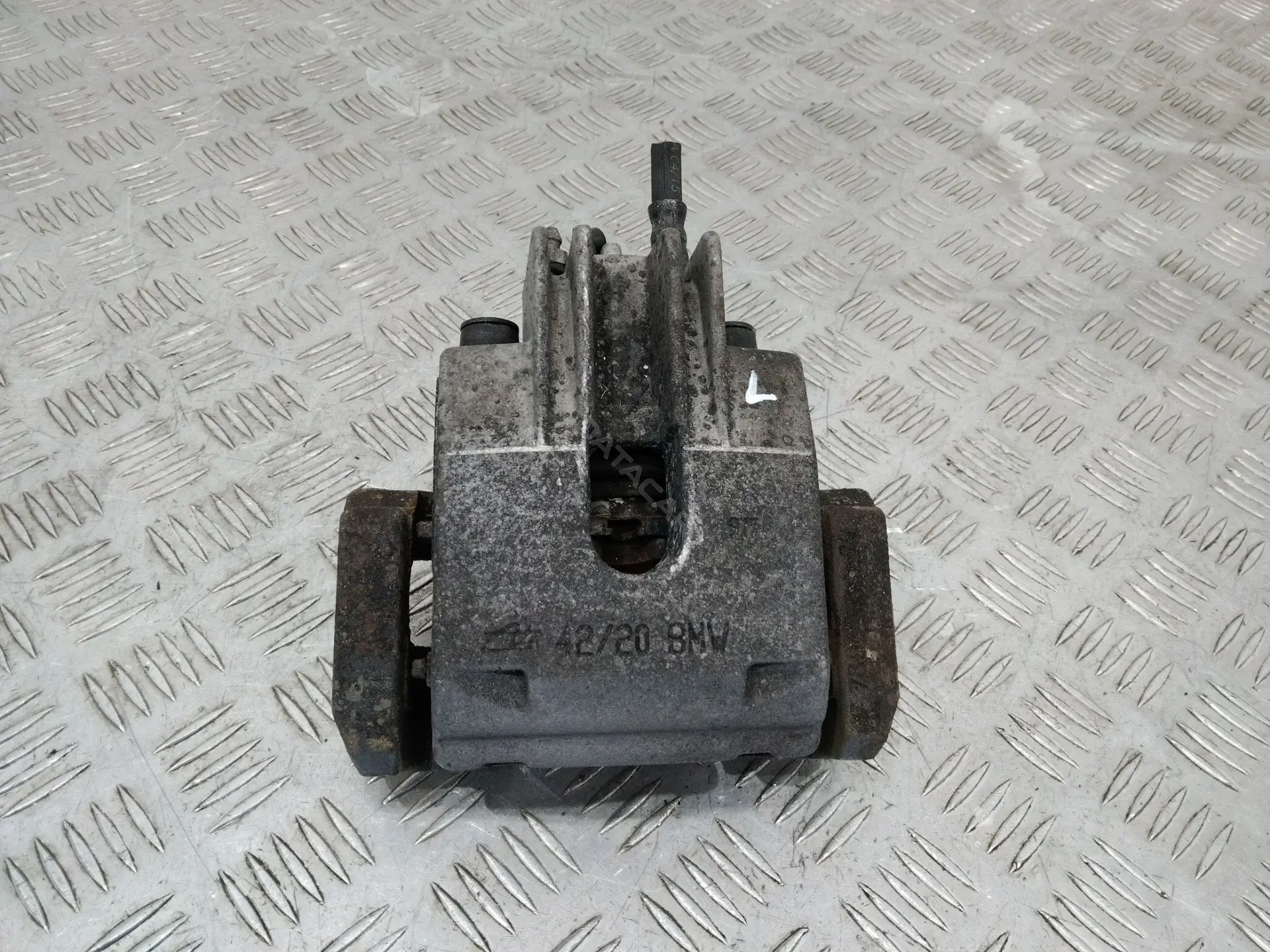 Суппорт тормозной 6713078