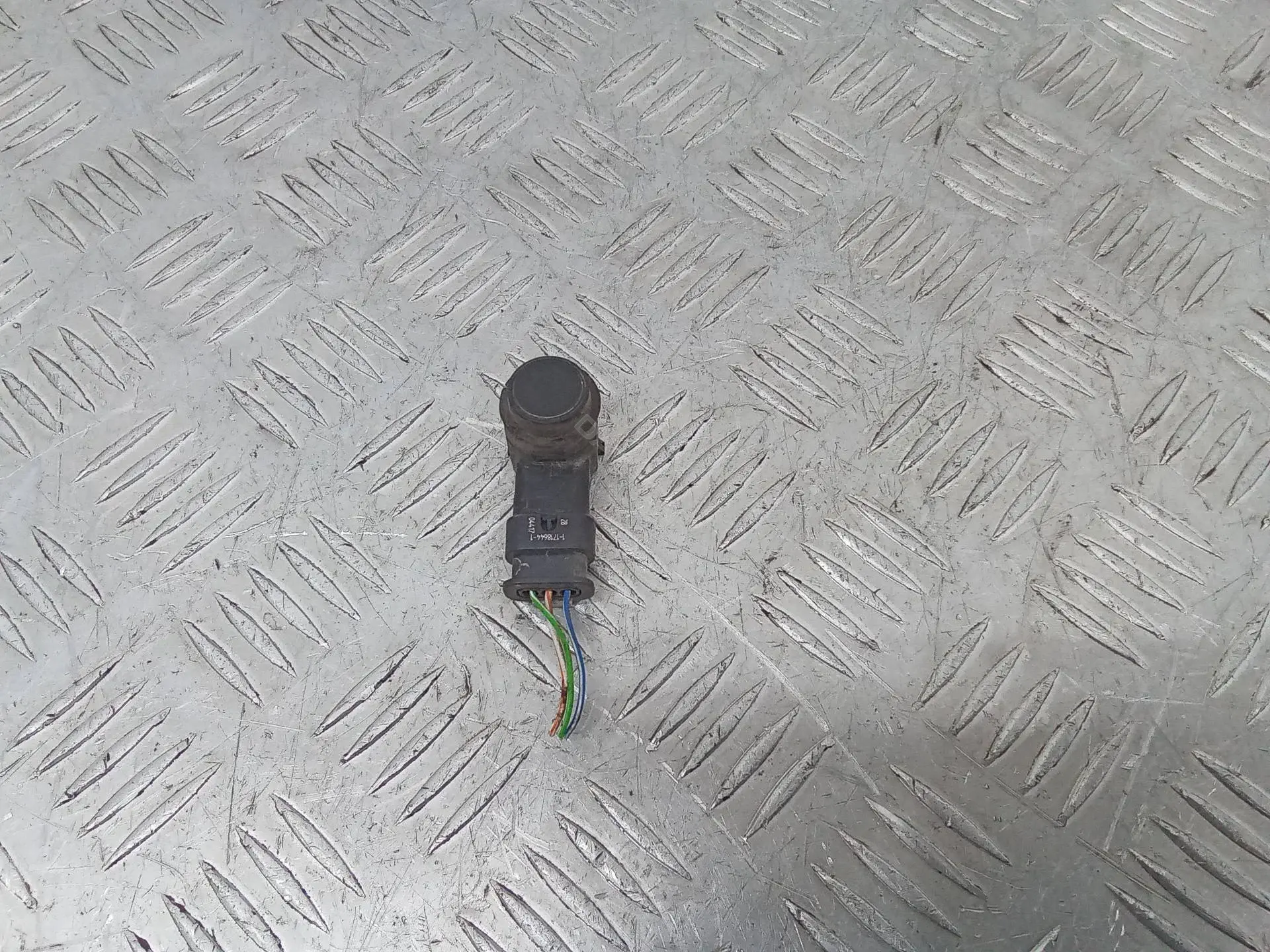 Датчик парктроника 9G9215K859DA