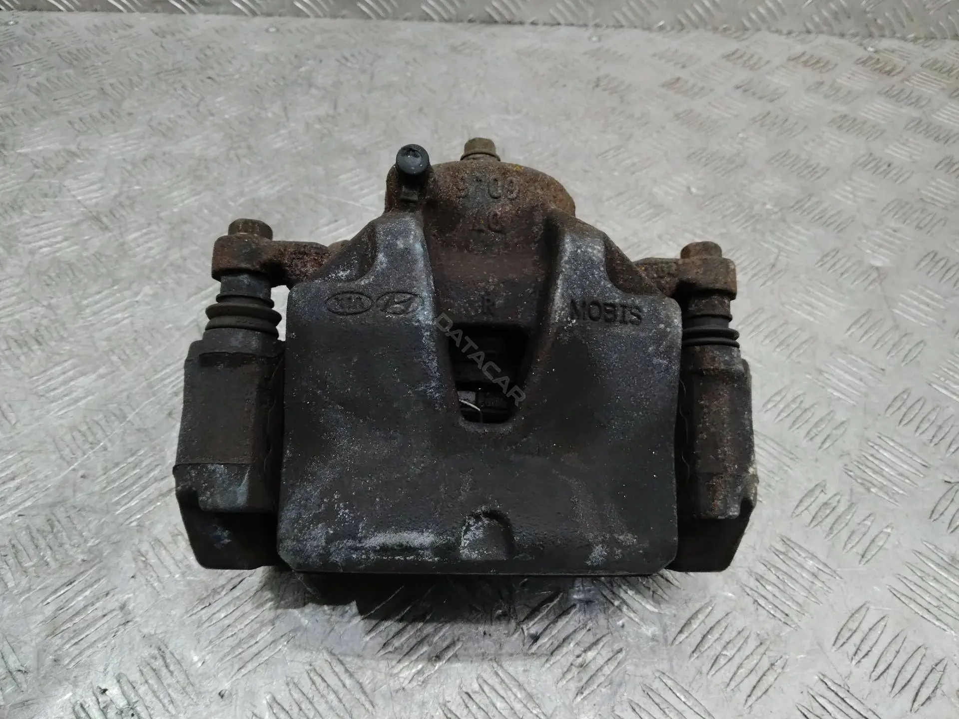 Суппорт тормозной 7759282